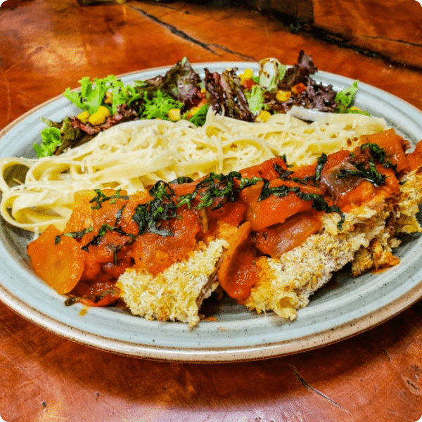Martes. Milanesa De Pollo Y Champ