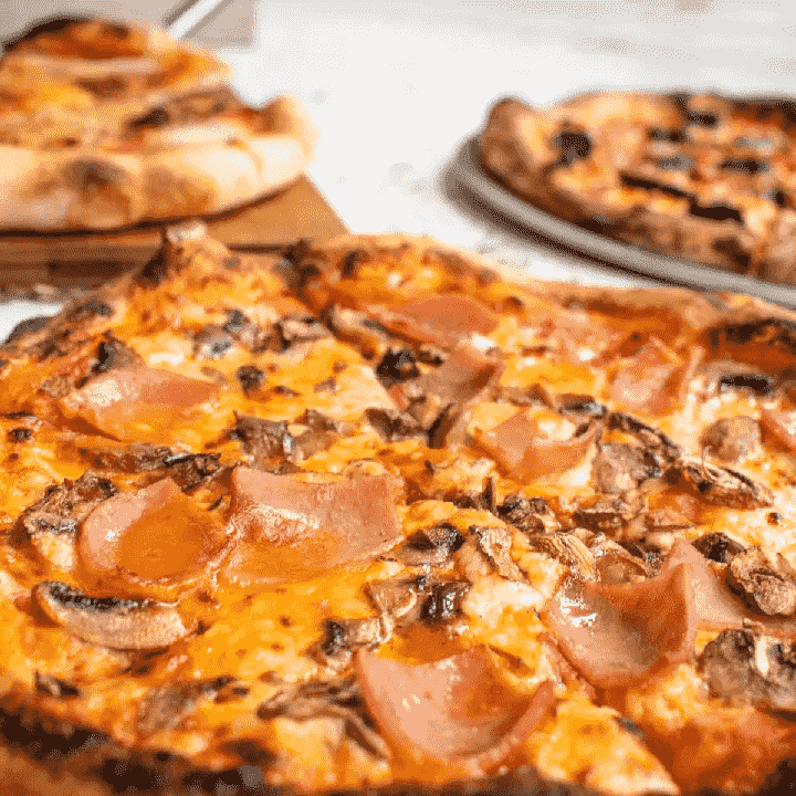 1/2 Pizza Jamon Y ChampiÑones